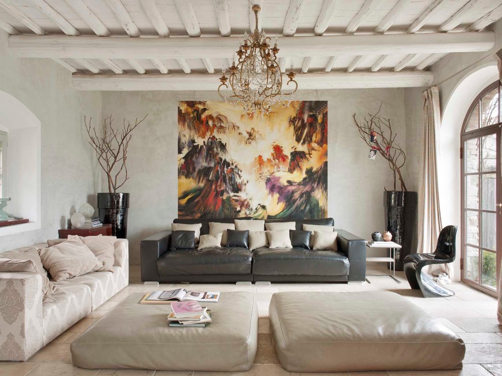This is an example of an eclectic enclosed living room in Florence.
