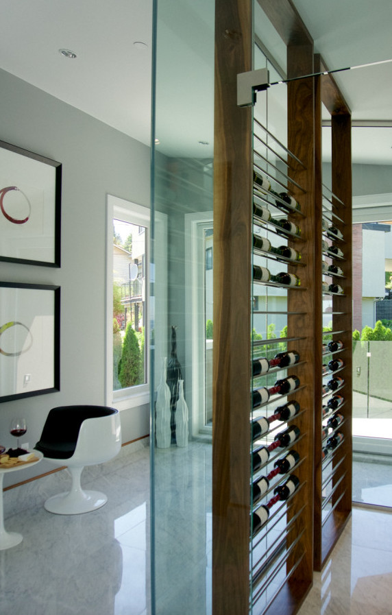 Inspiration for a small contemporary wine cellar in Vancouver with storage racks.