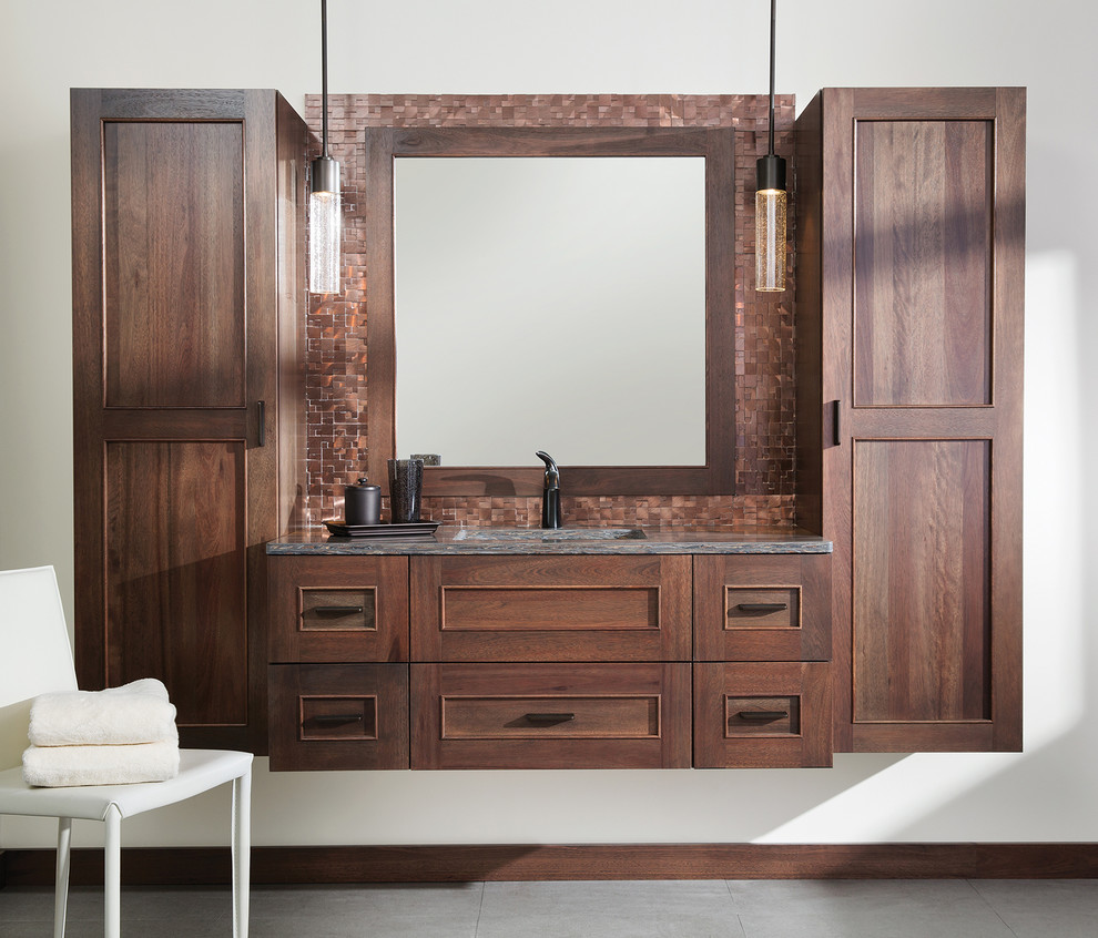 Design ideas for a mid-sized transitional master bathroom in Boston with flat-panel cabinets, medium wood cabinets, multi-coloured tile, metal tile, white walls, porcelain floors, an undermount sink, solid surface benchtops, grey floor and grey benchtops.
