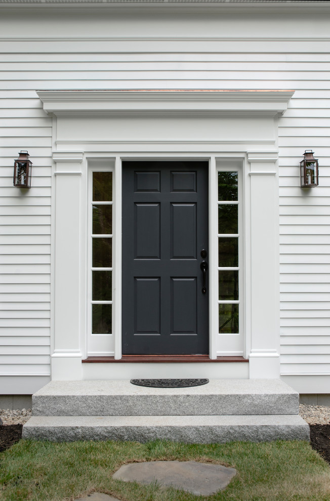 Mid-sized country front door in Boston with a single front door.