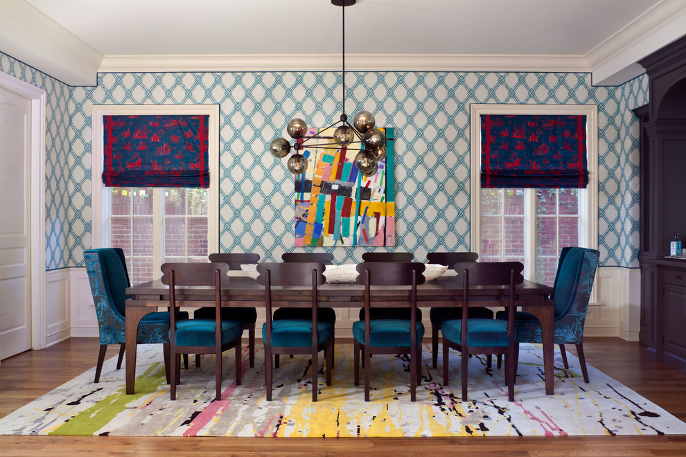 Inspiration for an eclectic separate dining room in Denver with multi-coloured walls and dark hardwood floors.