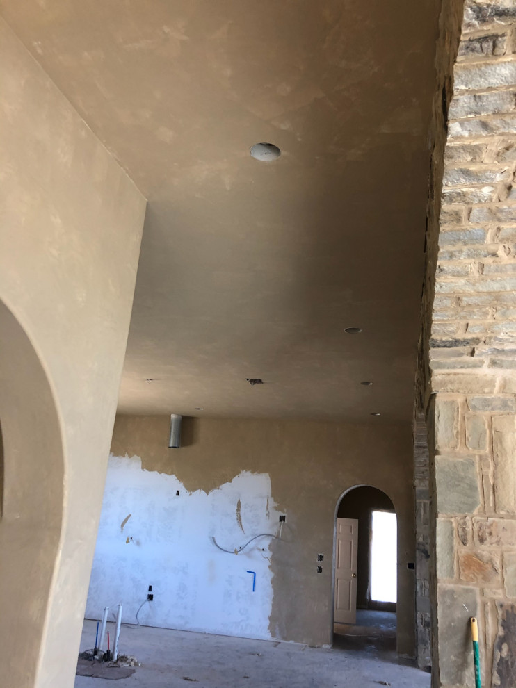 Example of a transitional home design design in Austin