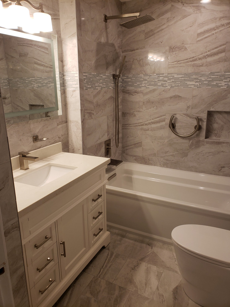 Wall to Wall Tile Bathroom