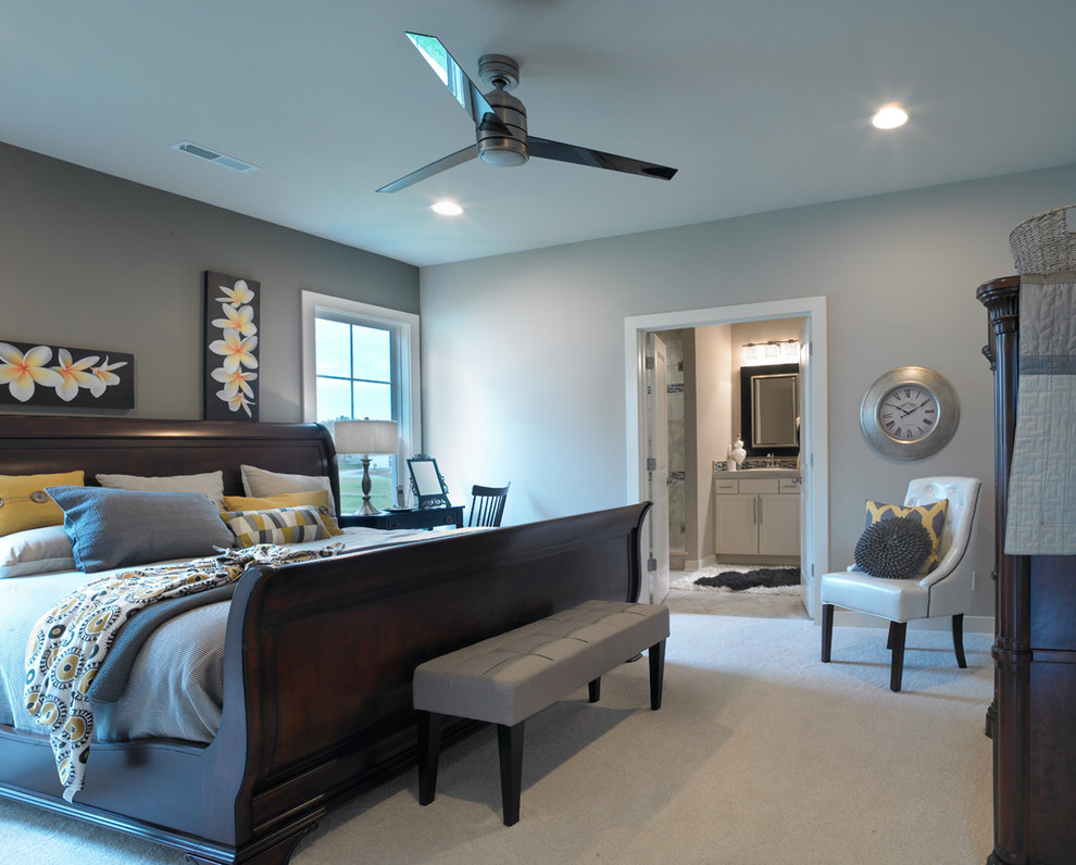 This is an example of a mid-sized transitional master bedroom in Other with carpet and grey walls.