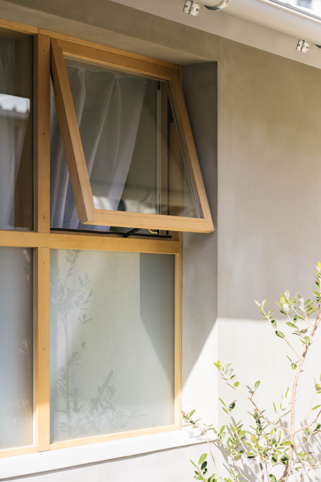 Überdachtes Modernes Veranda im Vorgarten mit Verkleidung und Natursteinplatten in Nagoya