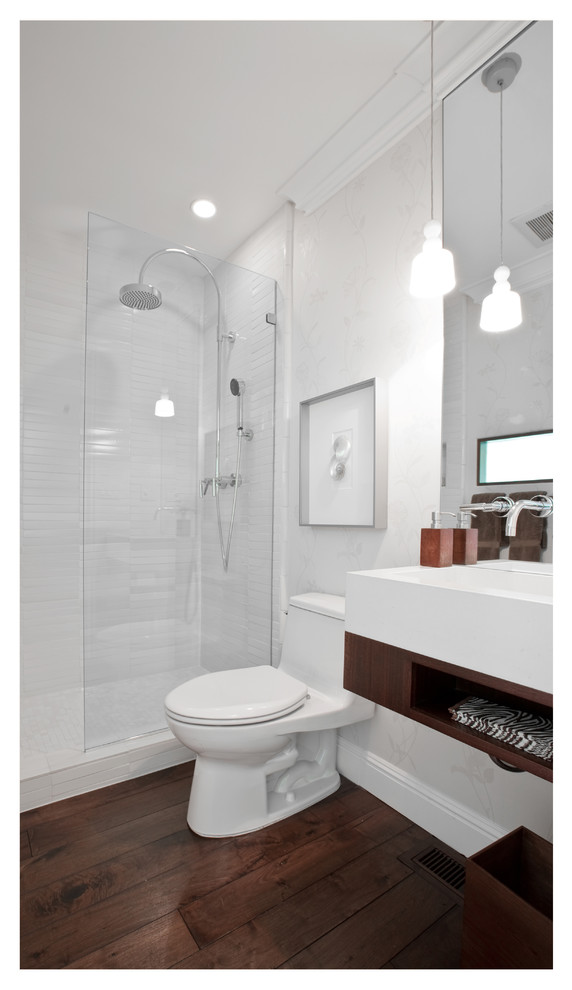 Photo of a large traditional 3/4 bathroom in San Francisco with a wall-mount sink, open cabinets, dark wood cabinets, an open shower, a one-piece toilet, white tile, white walls and dark hardwood floors.