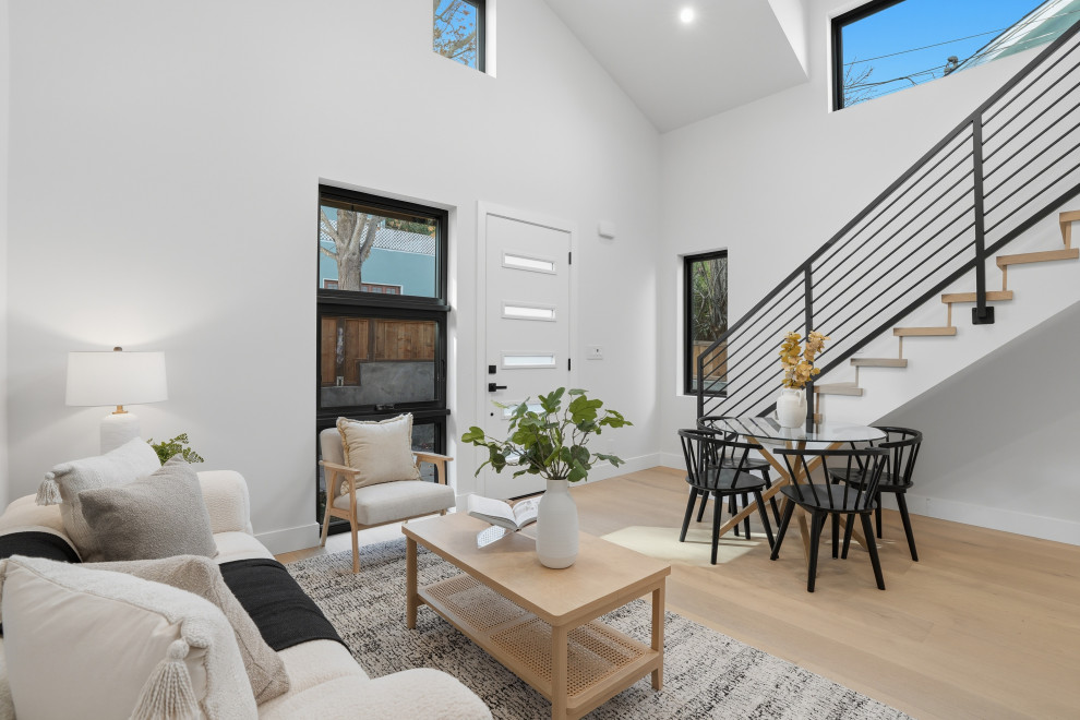 Double-Height ADU Living Space with Modern Open Staircase