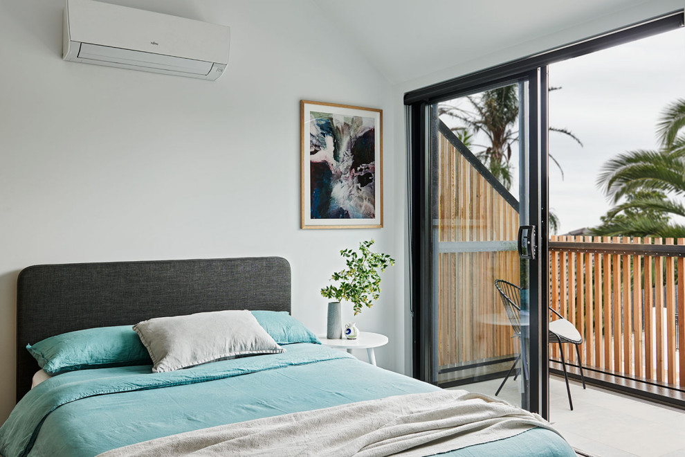 Inspiration for a small contemporary guest bedroom in Geelong with white walls, carpet, grey floor and vaulted.