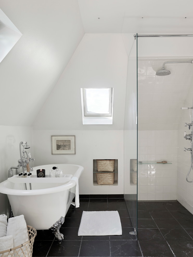 Photo of a mid-sized transitional master bathroom in Copenhagen with a freestanding tub, a corner shower, porcelain tile, white walls, ceramic floors and white tile.