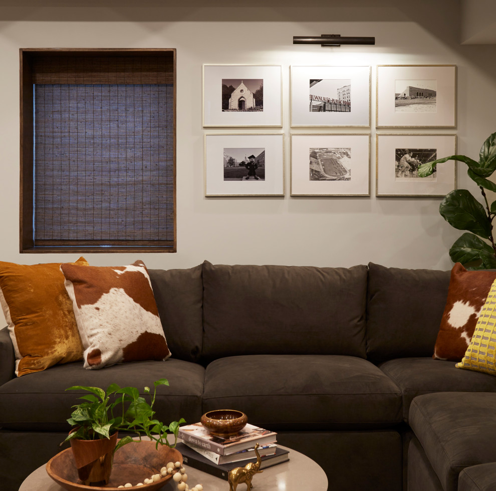 Design ideas for a transitional fully buried basement in Chicago with grey walls, vinyl floors, brown floor and wood.