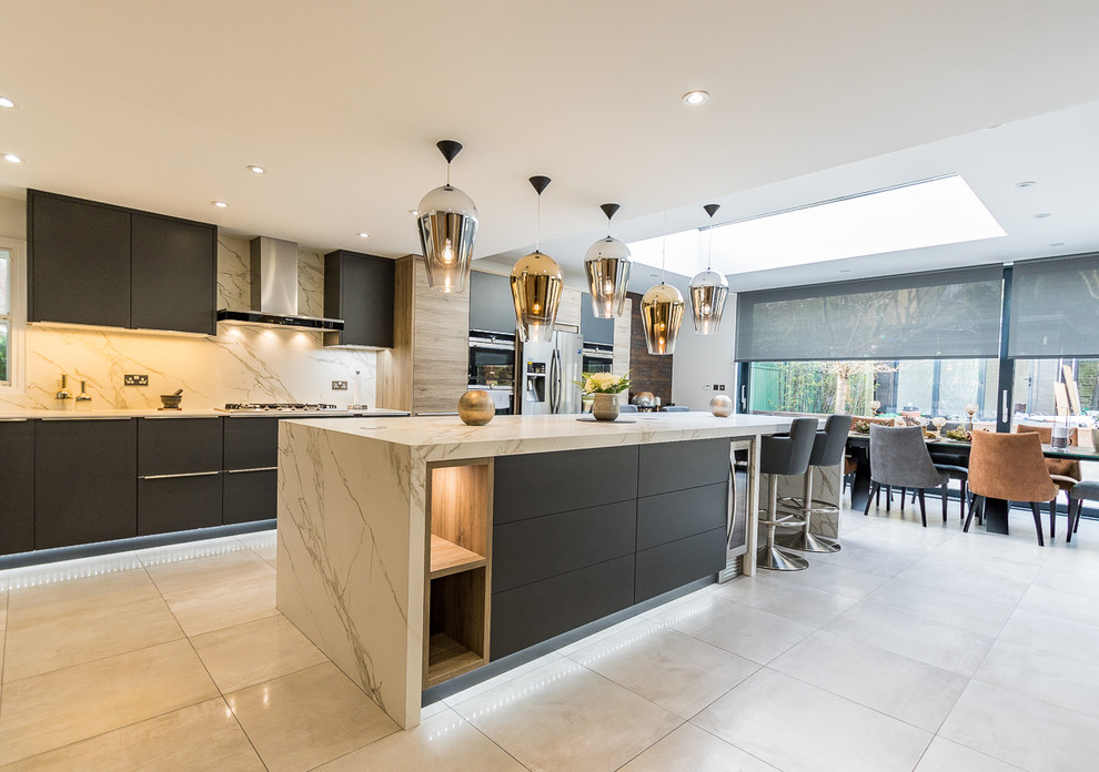 Photo of a large modern kitchen in Surrey.