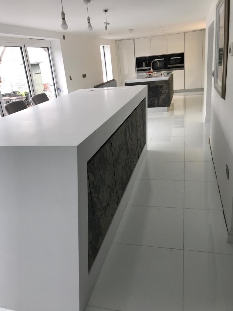 Real Slate doors and illuminated splash back.