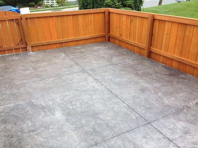 This is an example of a mid-sized arts and crafts backyard deck in Other with no cover.