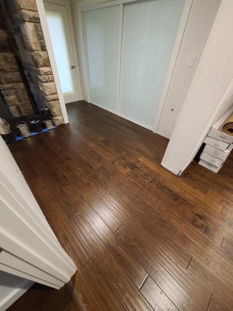 Sleek Engineered Hardwood & Modern Sliding Door by I’m The Man Services