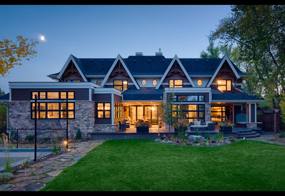 Home design - transitional two-story mixed siding beige home design idea in Calgary