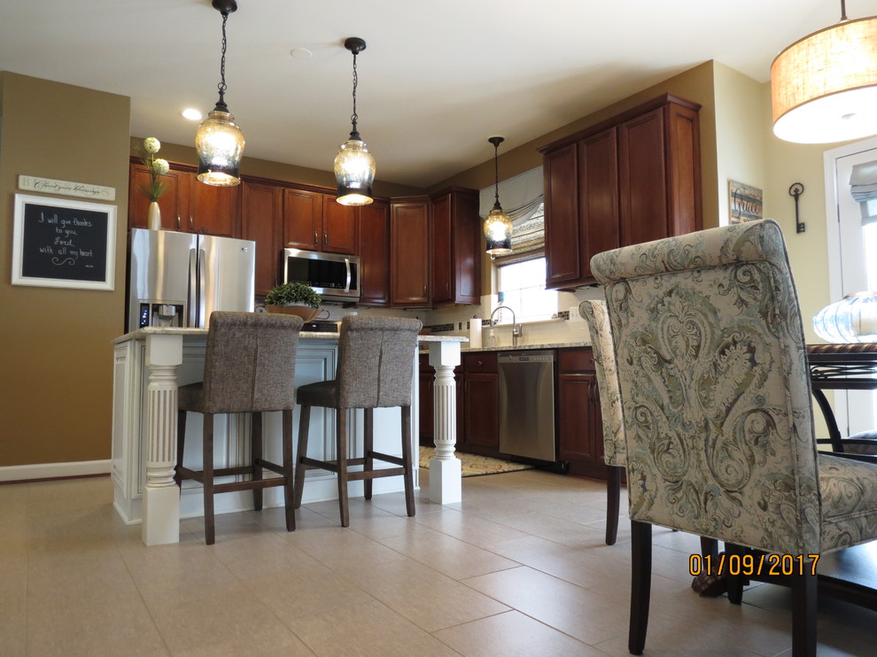 Eat-in kitchen - mid-sized transitional l-shaped ceramic tile eat-in kitchen idea with an undermount sink, raised-panel cabinets, distressed cabinets, granite countertops, white backsplash, porcelain backsplash, stainless steel appliances and an island