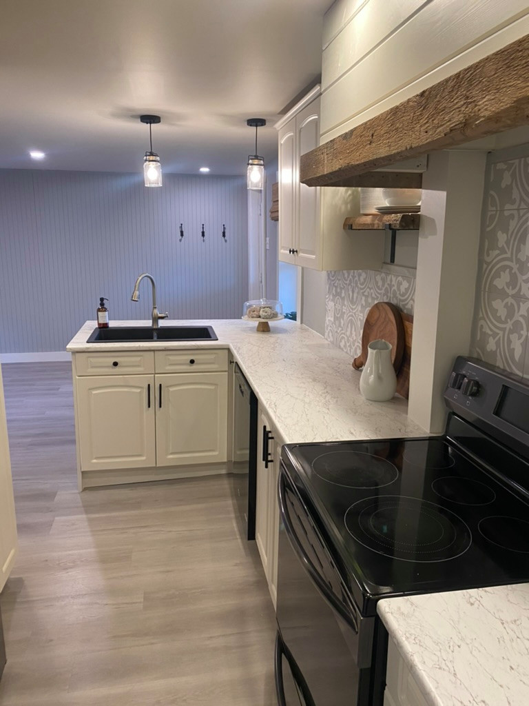 Example of a country kitchen design in Other
