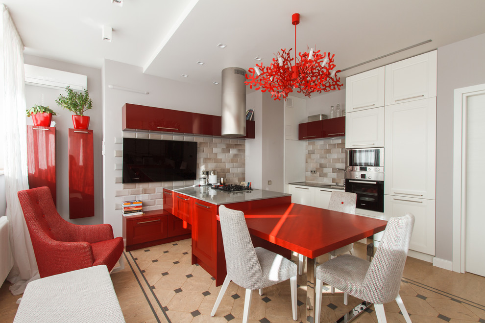 Small industrial u-shaped eat-in kitchen in Other with an undermount sink, recessed-panel cabinets, red cabinets, quartz benchtops, grey splashback, subway tile splashback, stainless steel appliances, cork floors, with island, beige floor and grey benchtop.