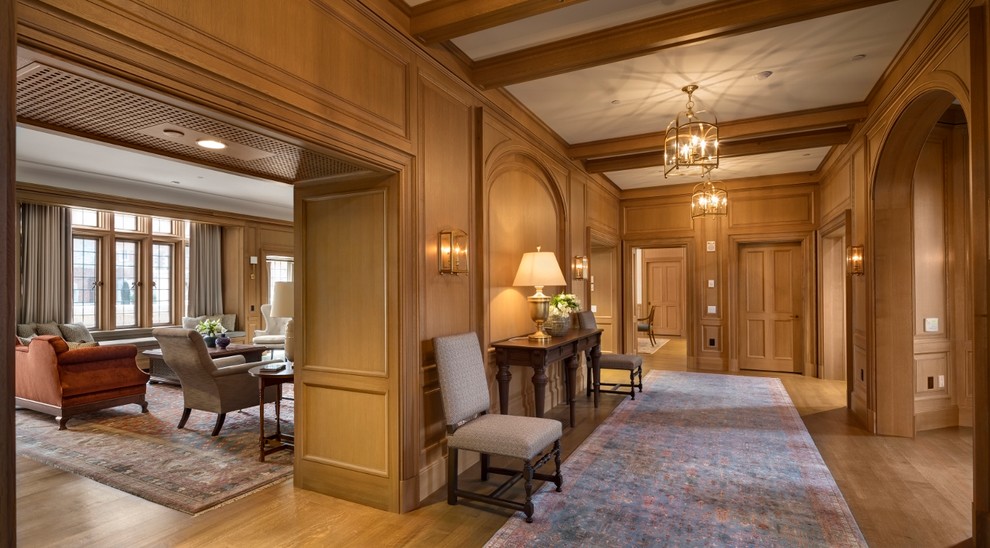 Large traditional entryway in New York with medium hardwood floors.