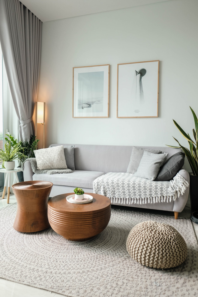 Photo of a mid-sized scandinavian open concept living room in Rennes with white walls, laminate floors, no fireplace, a wall-mounted tv, white floor and wallpaper.
