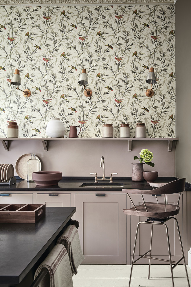 Transitional kitchen in Moscow with an undermount sink, recessed-panel cabinets, with island and beige floor.