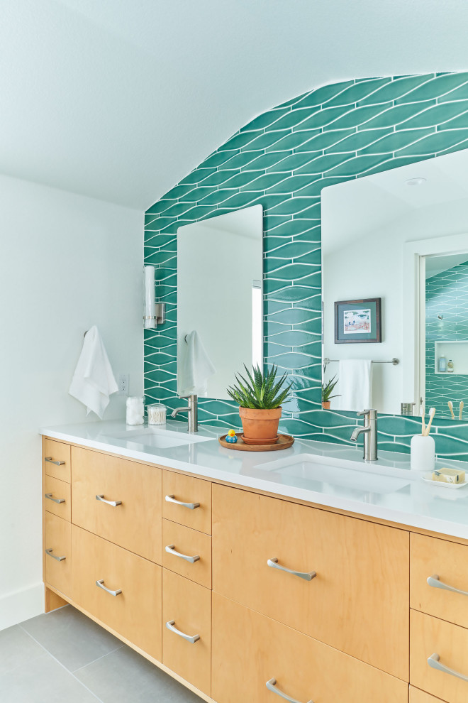 Medium sized traditional family bathroom in Austin with flat-panel cabinets, green tiles, a submerged sink, grey floors, white worktops, double sinks, a built in vanity unit and a vaulted ceiling.