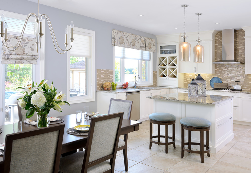 Mid-sized transitional l-shaped marble floor eat-in kitchen photo in Toronto with an undermount sink, flat-panel cabinets, white cabinets, granite countertops, multicolored backsplash, subway tile backsplash, stainless steel appliances and an island