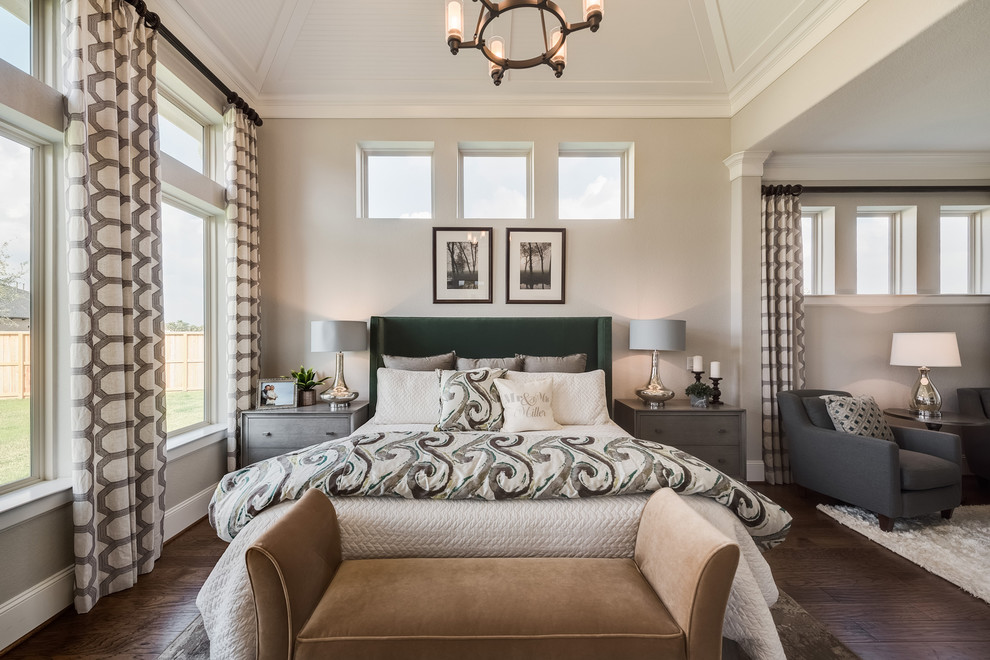 Inspiration for a transitional dark wood floor and brown floor bedroom remodel in Houston with gray walls
