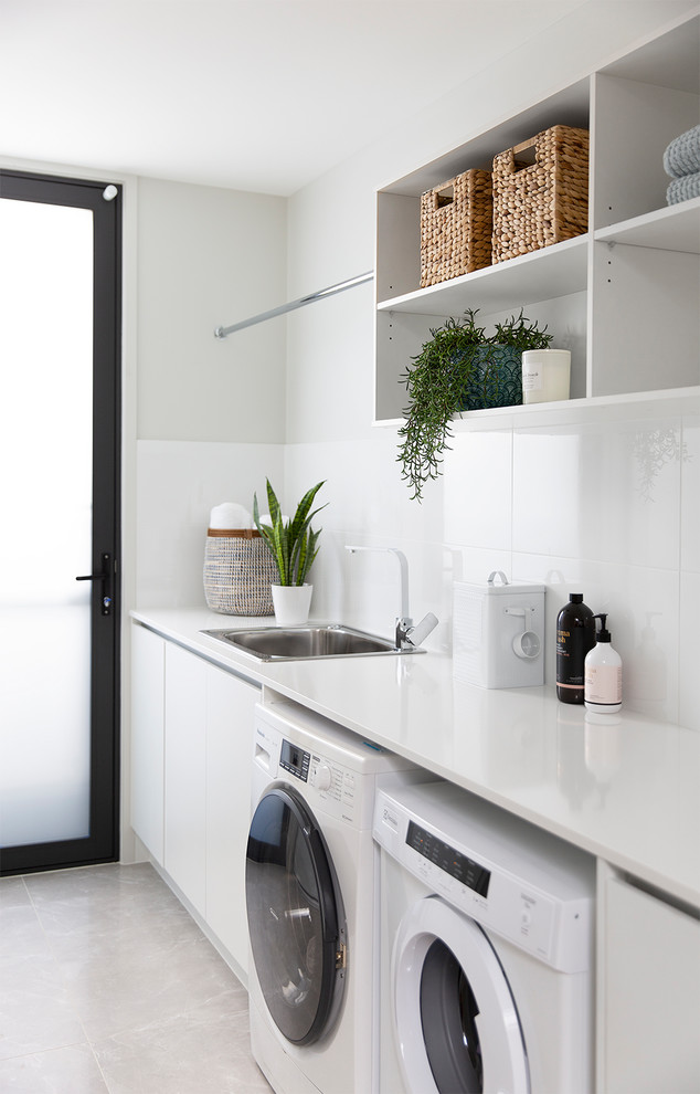 Design ideas for a scandinavian laundry room in Brisbane.