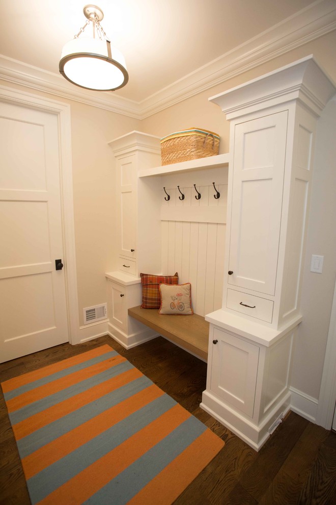 Mid-sized transitional dark wood floor entryway photo in San Diego with beige walls and a white front door
