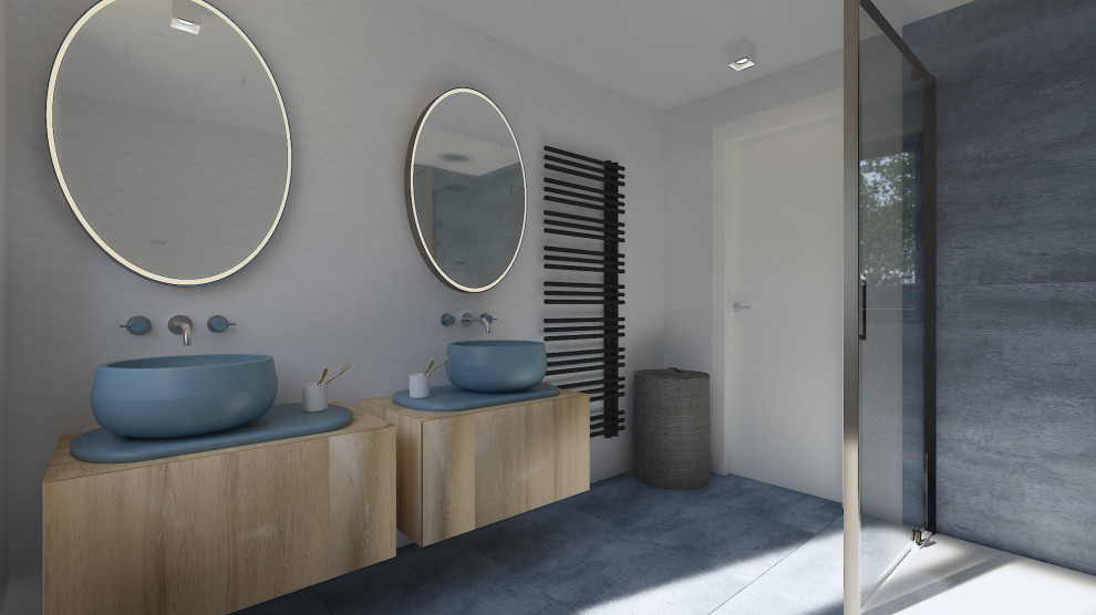 Cette photo montre une salle de bain principale tendance en bois clair de taille moyenne avec un placard à porte plane, une douche à l'italienne, WC suspendus, une vasque, un plan de toilette en carrelage, une cabine de douche à porte battante, un plan de toilette bleu, meuble double vasque et meuble-lavabo suspendu.