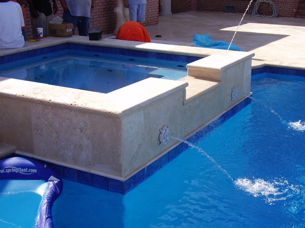 This is an example of a contemporary pool in Other.