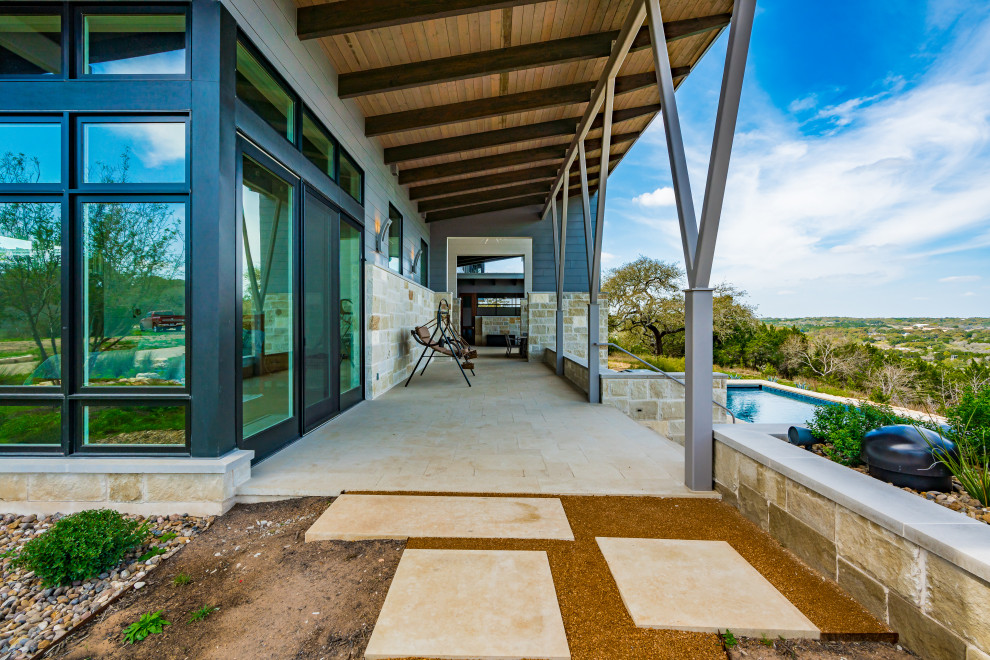 This is an example of a contemporary deck in Austin.