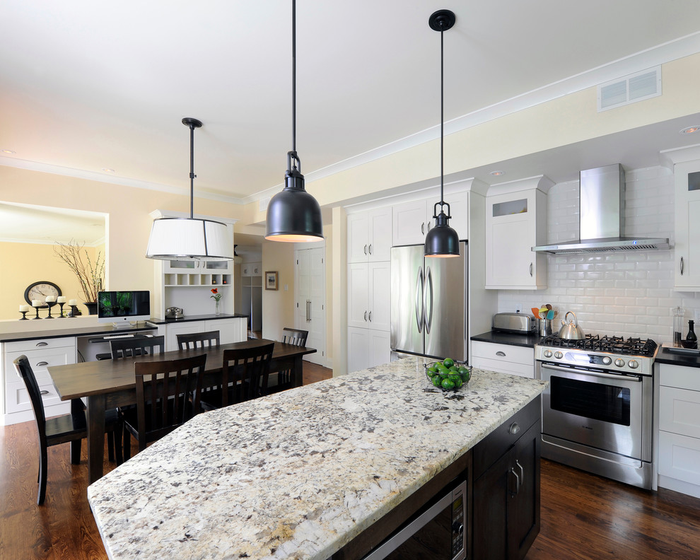 This is an example of a traditional kitchen in Ottawa with granite benchtops.