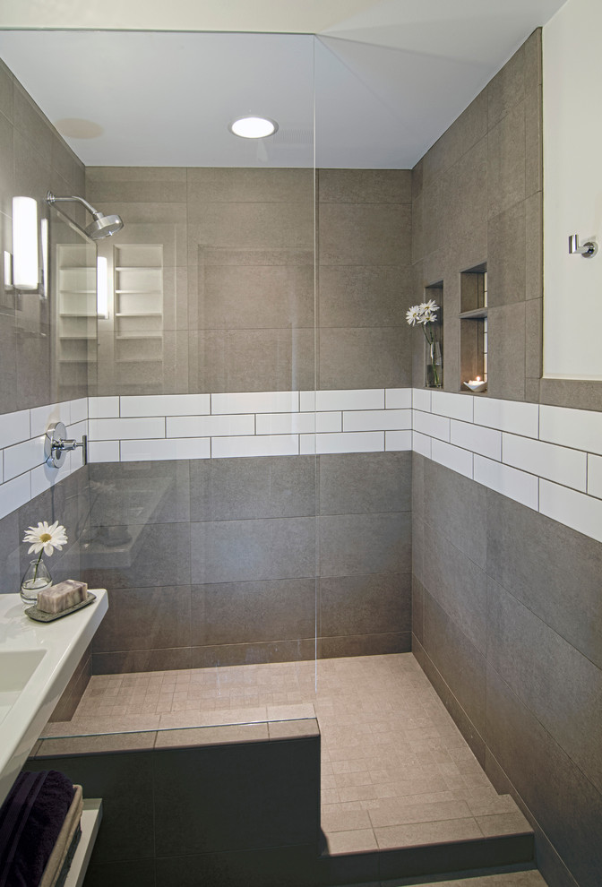 Inspiration for a small modern 3/4 bathroom in Cincinnati with open cabinets, white cabinets, an open shower, ceramic tile, white walls, ceramic floors, a wall-mount sink, grey floor, an open shower, gray tile and engineered quartz benchtops.