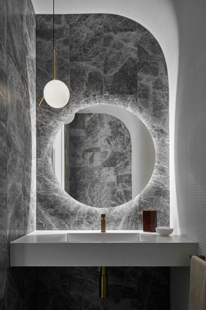 Design ideas for a small contemporary powder room in Melbourne with white tile, matchstick tile, an integrated sink, solid surface benchtops and white benchtops.