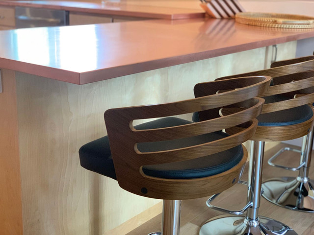 Example of a mid-sized 1960s l-shaped eat-in kitchen design in Other with stainless steel appliances and no island