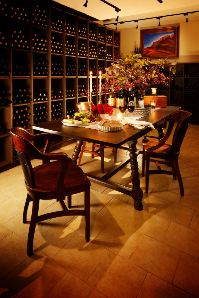 Photo of a large transitional wine cellar in Other with porcelain floors and diamond bins.
