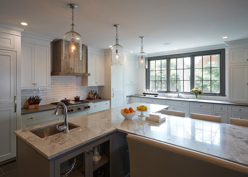 This is an example of a large transitional kitchen in Chicago.