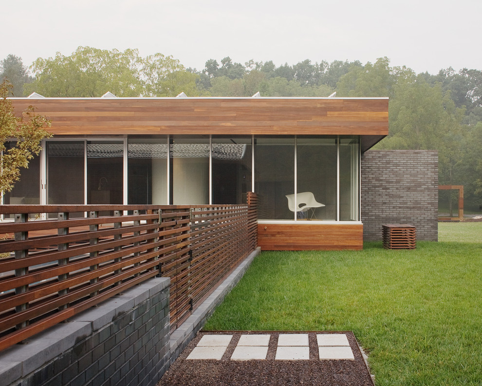Inspiration for a contemporary exterior in Kansas City with wood siding.