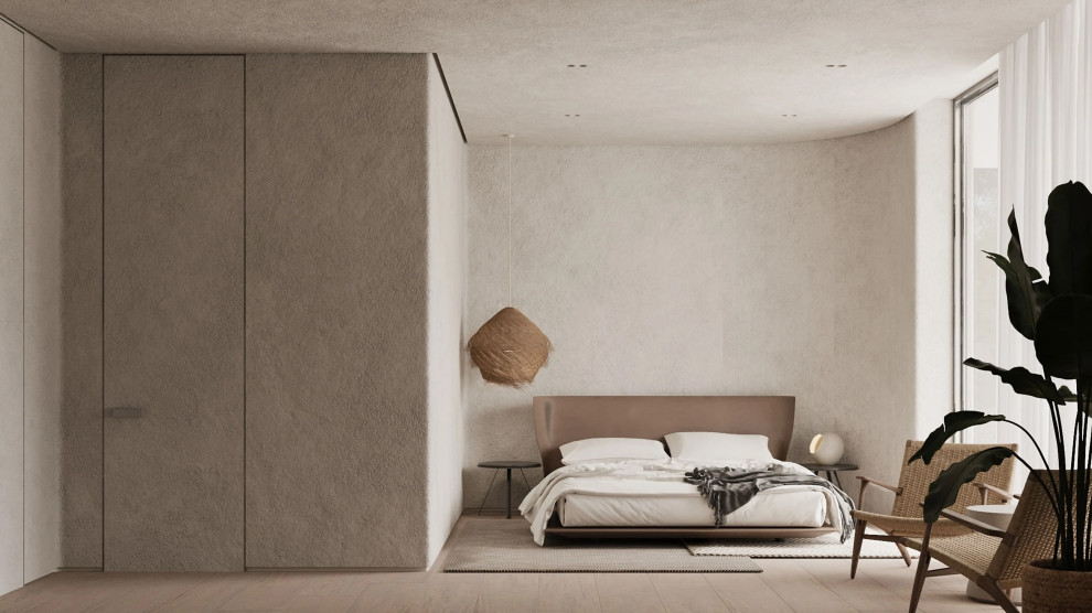 Imagen de habitación de invitados minimalista de tamaño medio sin chimenea con paredes beige, suelo de madera clara y suelo beige