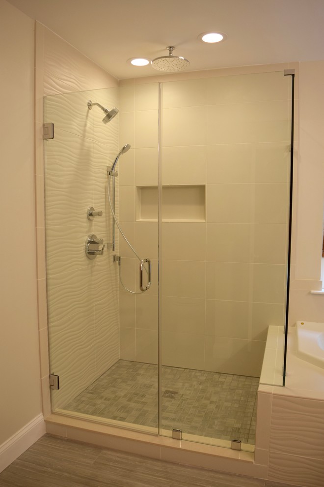 Design ideas for a large contemporary master bathroom in DC Metro with flat-panel cabinets, brown cabinets, a corner tub, an open shower, a two-piece toilet, beige tile, ceramic tile, grey walls, ceramic floors, an undermount sink and engineered quartz benchtops.