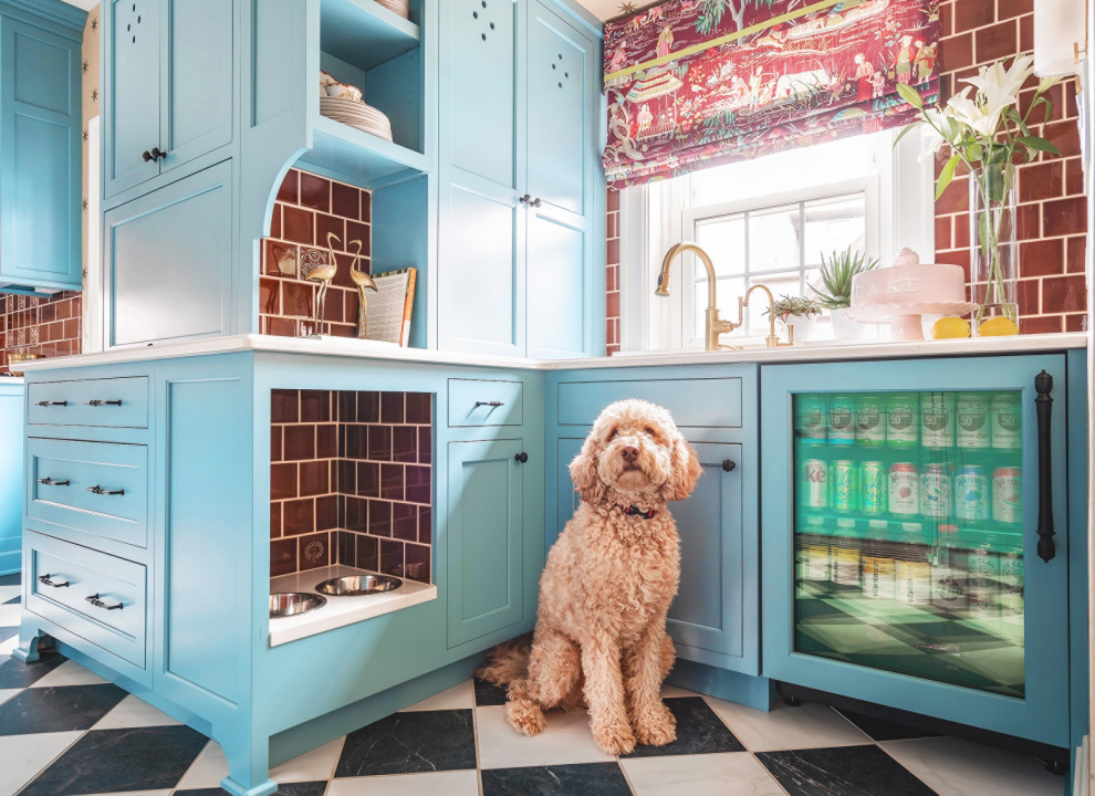 Design ideas for a traditional home bar with blue cabinets, ceramic splashback, ceramic floors, multi-coloured floor, white benchtop and red splashback.