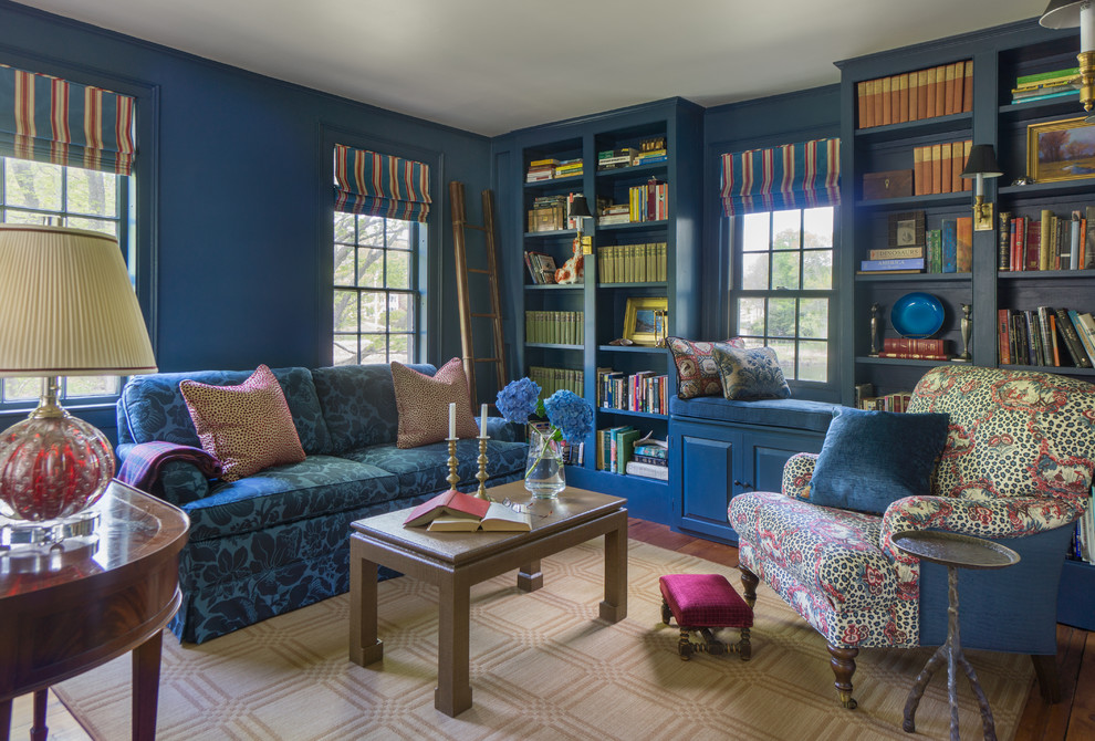 Design ideas for an eclectic family room in Boston with a library.