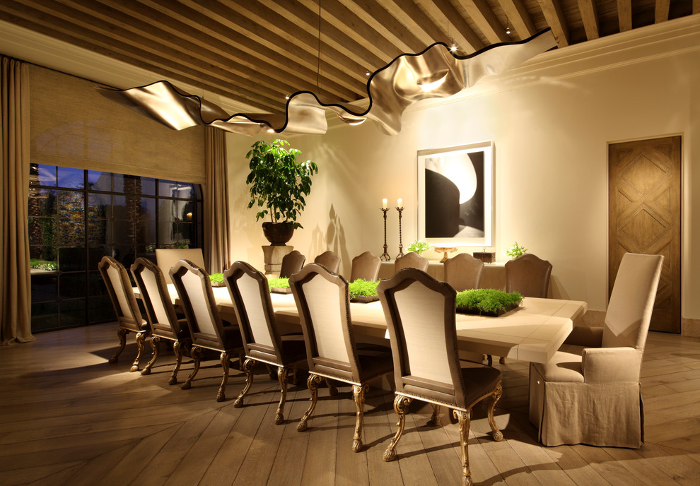 Example of a tuscan dining room design in Los Angeles