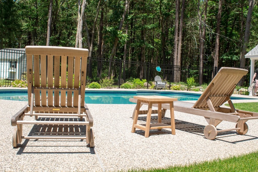 Pool house - mid-sized transitional backyard custom-shaped and decomposed granite lap pool house idea in Boston