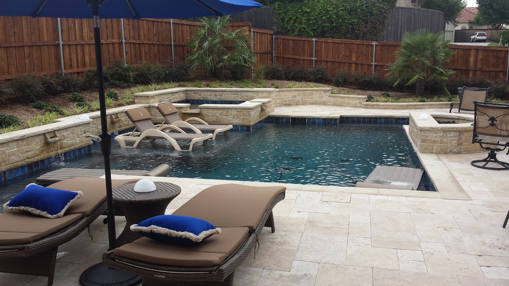 Pool - mid-sized rustic backyard stone and custom-shaped natural pool idea in Orange County