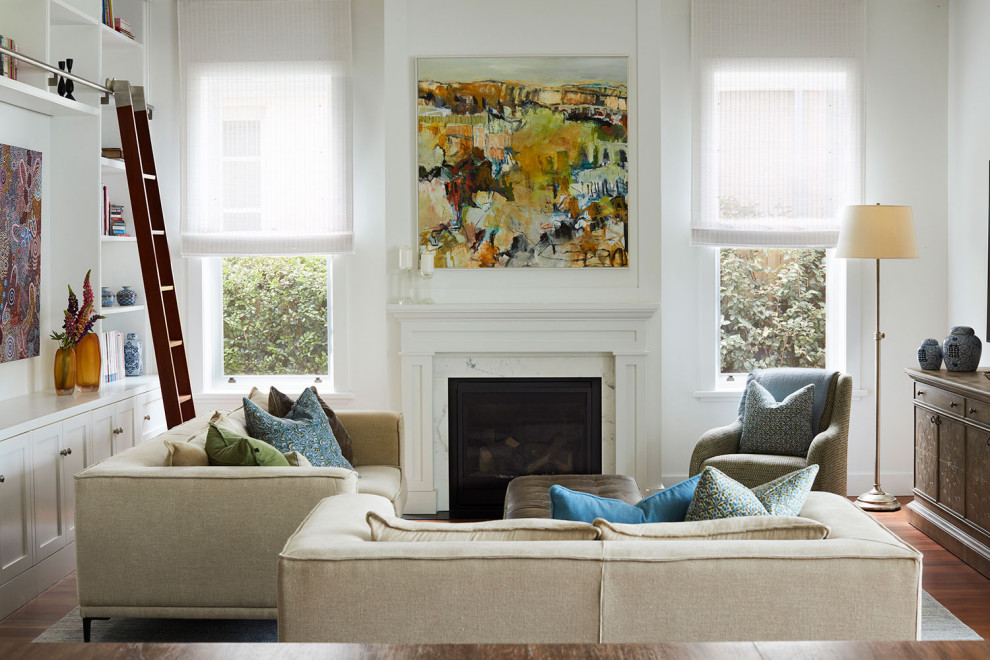 Design ideas for a large eclectic open concept living room in Sydney with a library, white walls and medium hardwood floors.