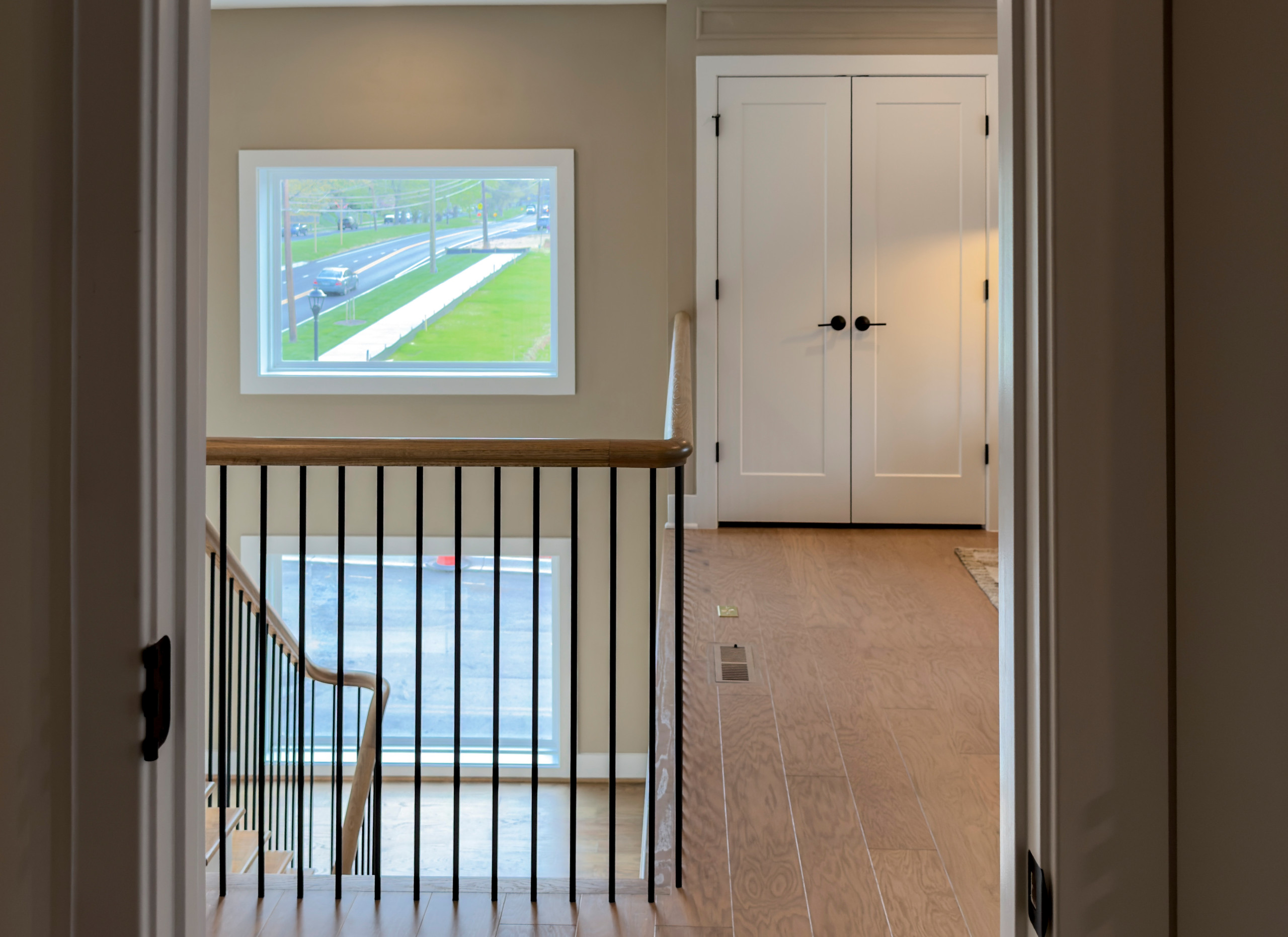 Project #153 | Sophisticated Red Oak Stair with Metal Balusters