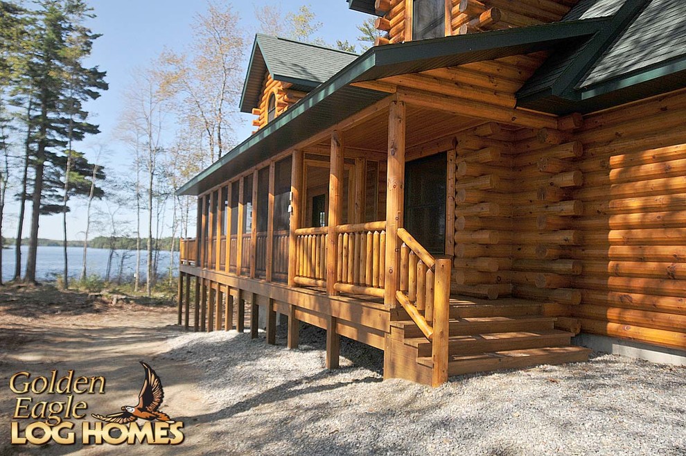 Example of a large mountain style home design design
